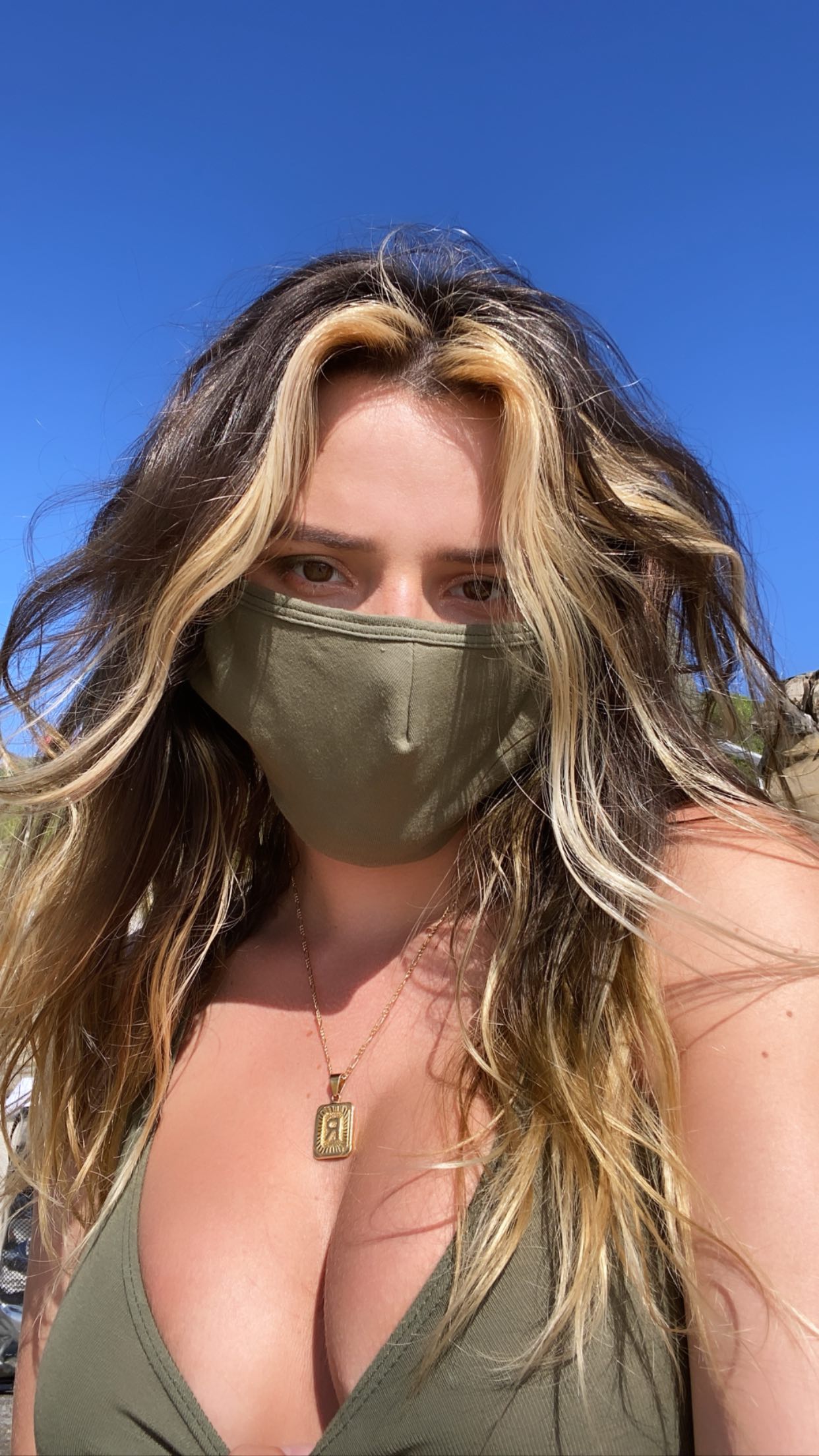 Bella Thorne Matches her Mask to her Bra!