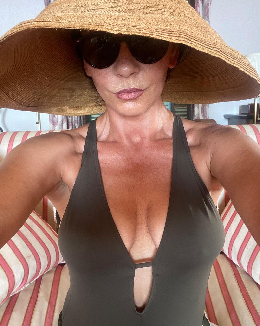 Catherine Zeta Jones Selfies in Her Swimsuit! - Photo 1