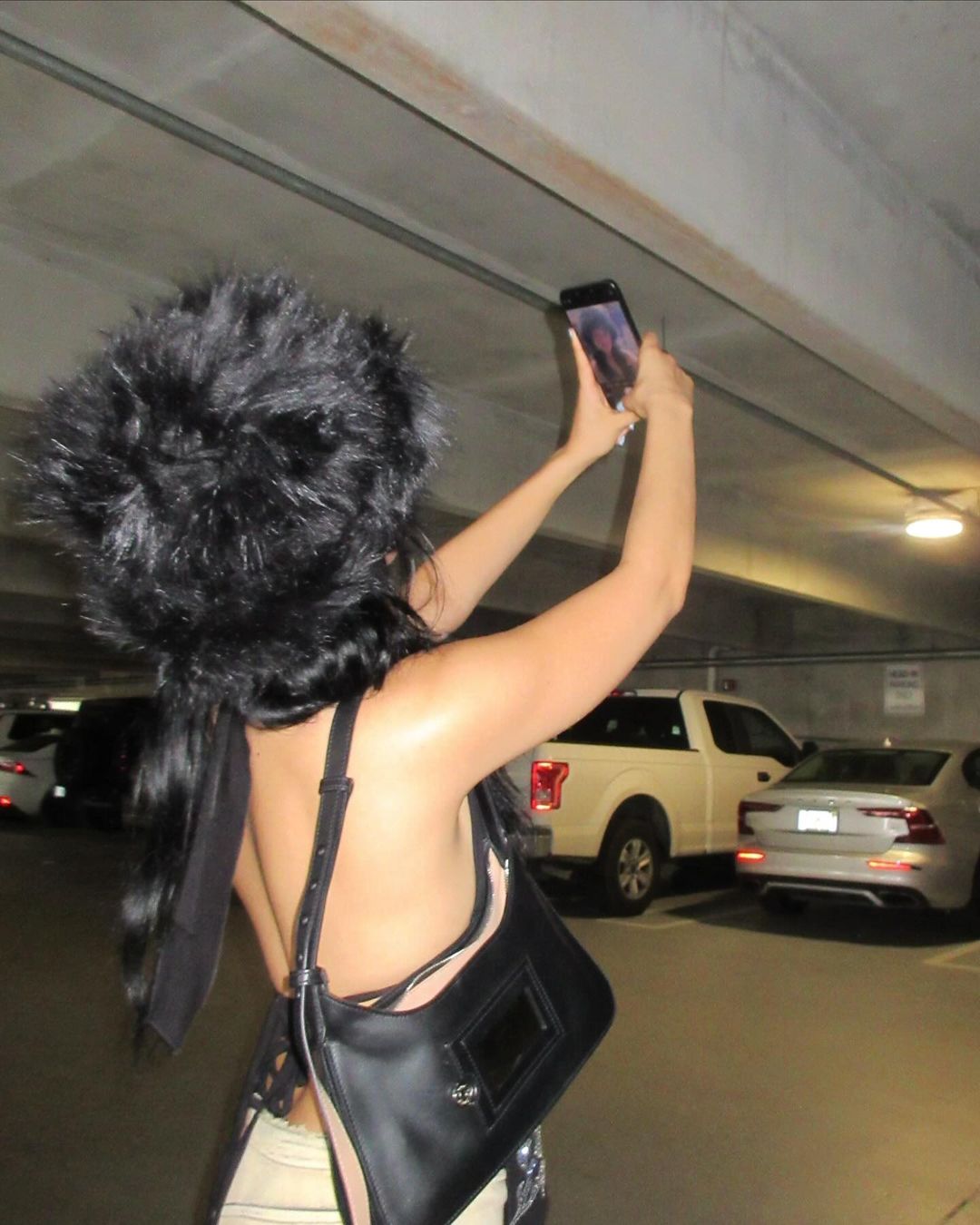Photos n°2 : Camila Cabello Gets Cryptic in the Parking Garage!
